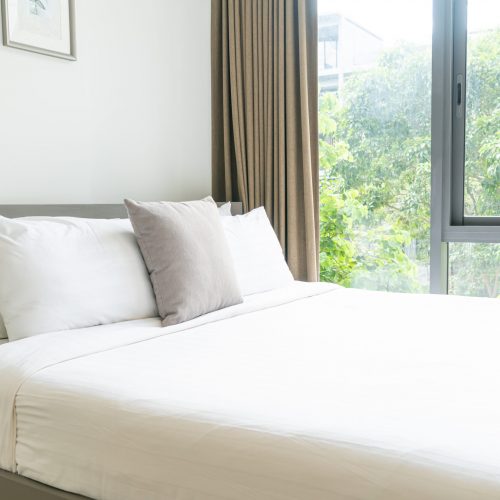 comfortable pillow decoration on bed in bedroom